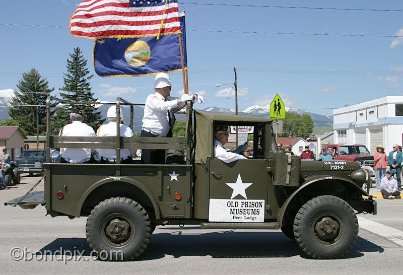 Deer-Lodge-Parade_14665.jpg - WW2 army vehicles vehicles drive along Main Street during the Territorial Days Parade in Deer Lodge Montana, June 14th 2008