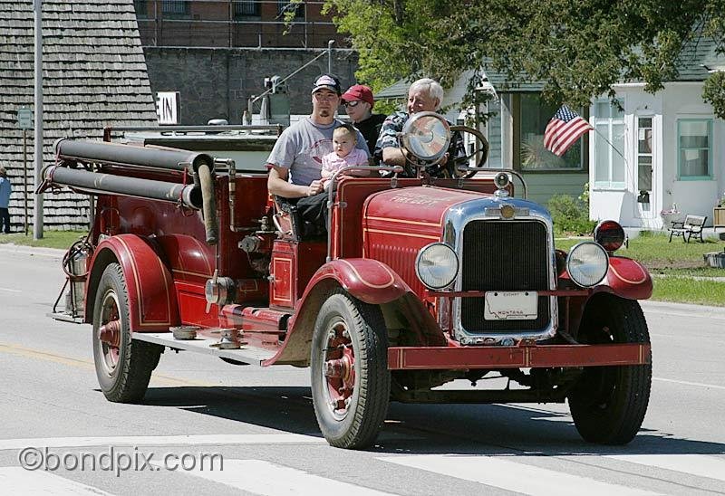 Deer-Lodge-Parade_14681.jpg - A vintage fire truck drives along Main Street during the Territorial Days Parade in Deer Lodge Montana, June 14th 2008