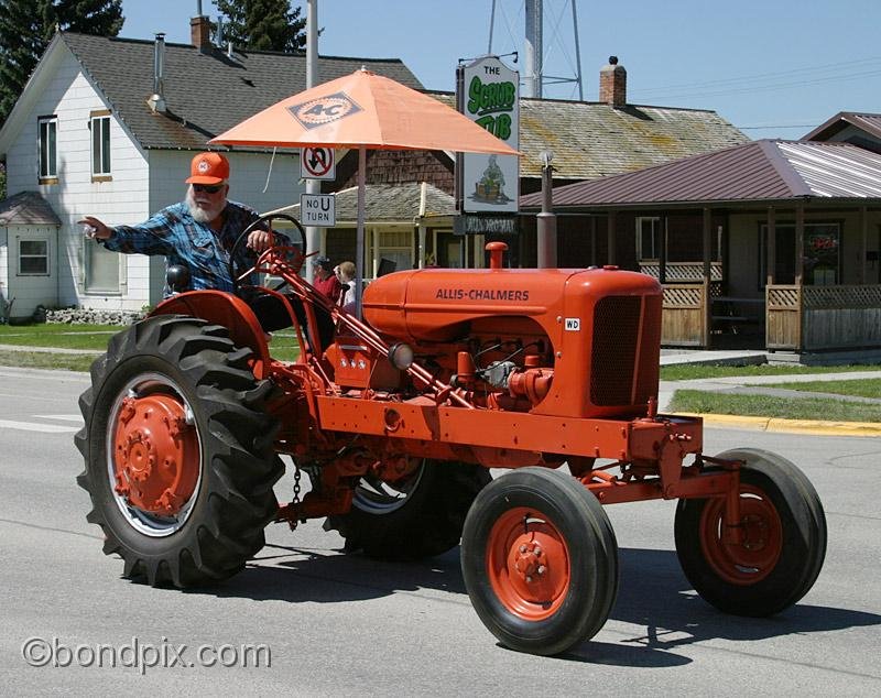 Deer-Lodge-Parade_14784.jpg - Vintage tractors drive along Main Street during the Territorial Days Parade in Deer Lodge Montana, June 14th 2008