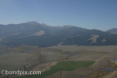 Aerial views over the Deer Lodge valley, Deer Lodge, Anaconda and Butte in Montana