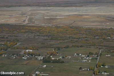 Aerial views over the Deer Lodge valley, Deer Lodge, Anaconda and Butte in Montana