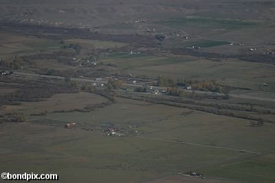 Aerial views over the Deer Lodge valley, Deer Lodge, Anaconda and Butte in Montana