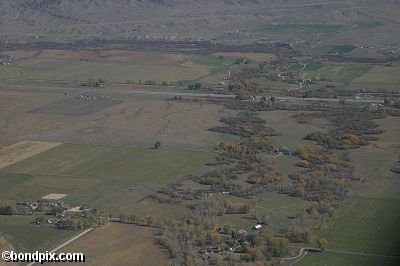 Aerial views over the Deer Lodge valley, Deer Lodge, Anaconda and Butte in Montana