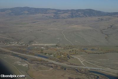 Aerial views over the Deer Lodge valley, Deer Lodge, Anaconda and Butte in Montana