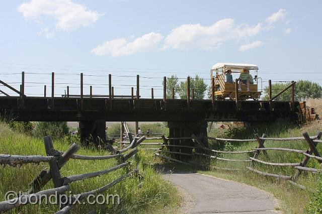 0955.jpg - A speeder travels along the old Milwaukee Road railroad trestle bridge