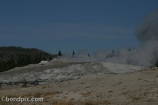 Old Faithful geyser errupts in Yellowstone Park