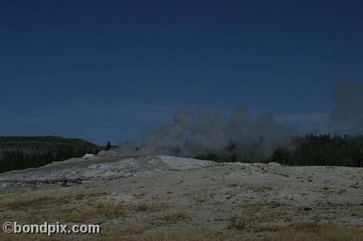 Old Faithful geyser errupts in Yellowstone Park